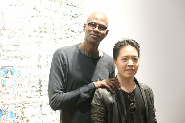 Michael Andrew Law and Mr. Mark Bradford.